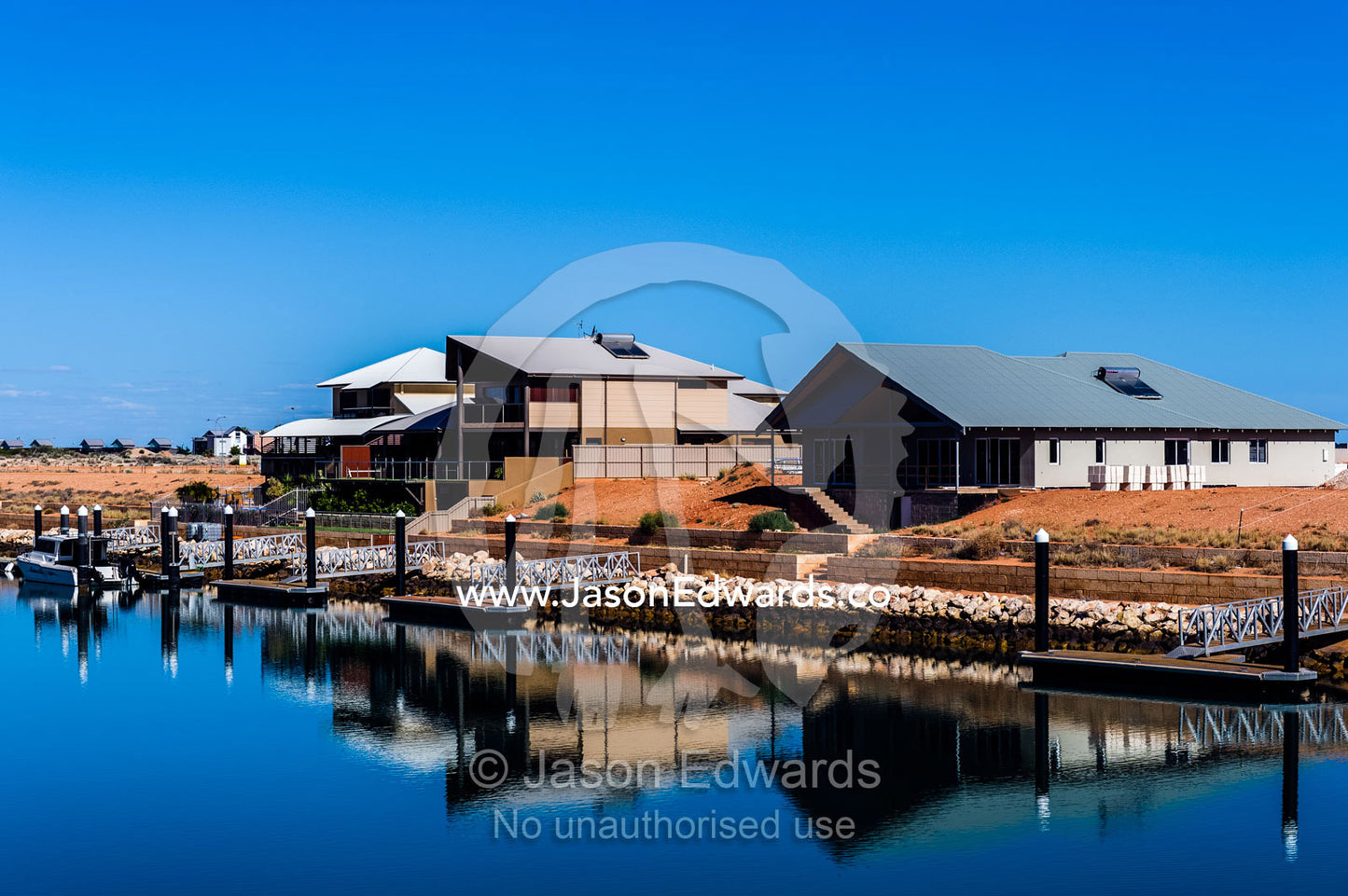 A new housing estate on a fishing mariner in outback Australia. Exmouth, Ningaloo Reef, Western Australia, Australia.