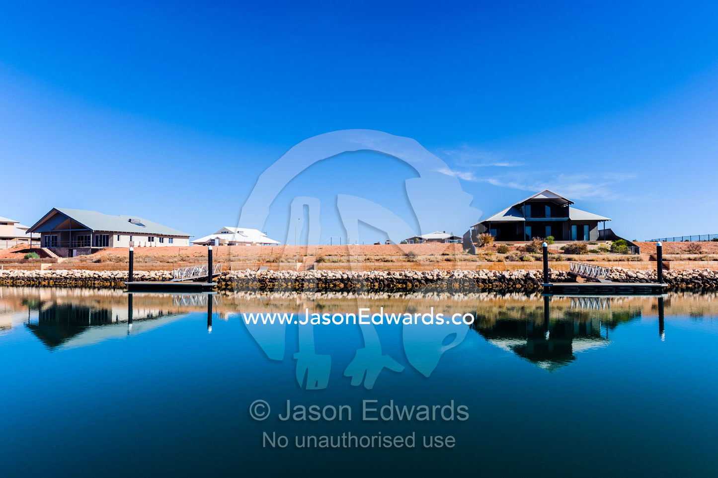 A new housing estate on a fishing mariner in outback Australia. Exmouth, Ningaloo Reef, Western Australia, Australia.