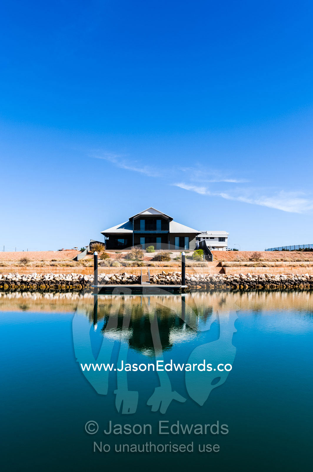 A new housing estate on a fishing mariner in outback Australia. Exmouth, Ningaloo Reef, Western Australia, Australia.