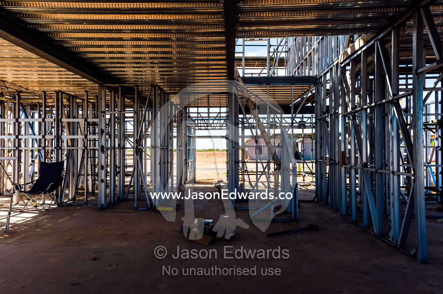 House construction in a new estate using steel and timber frames. Exmouth, Ningaloo Reef, Western Australia, Australia.