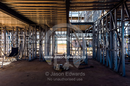 House construction in a new estate using steel and timber frames. Exmouth, Ningaloo Reef, Western Australia, Australia.