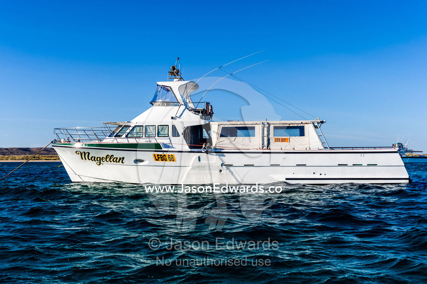 A commercial boat used for fishing charters and whale shark tours. Exmouth, Ningaloo Reef, Ningaloo Marine Park, Western Australia, Australia.