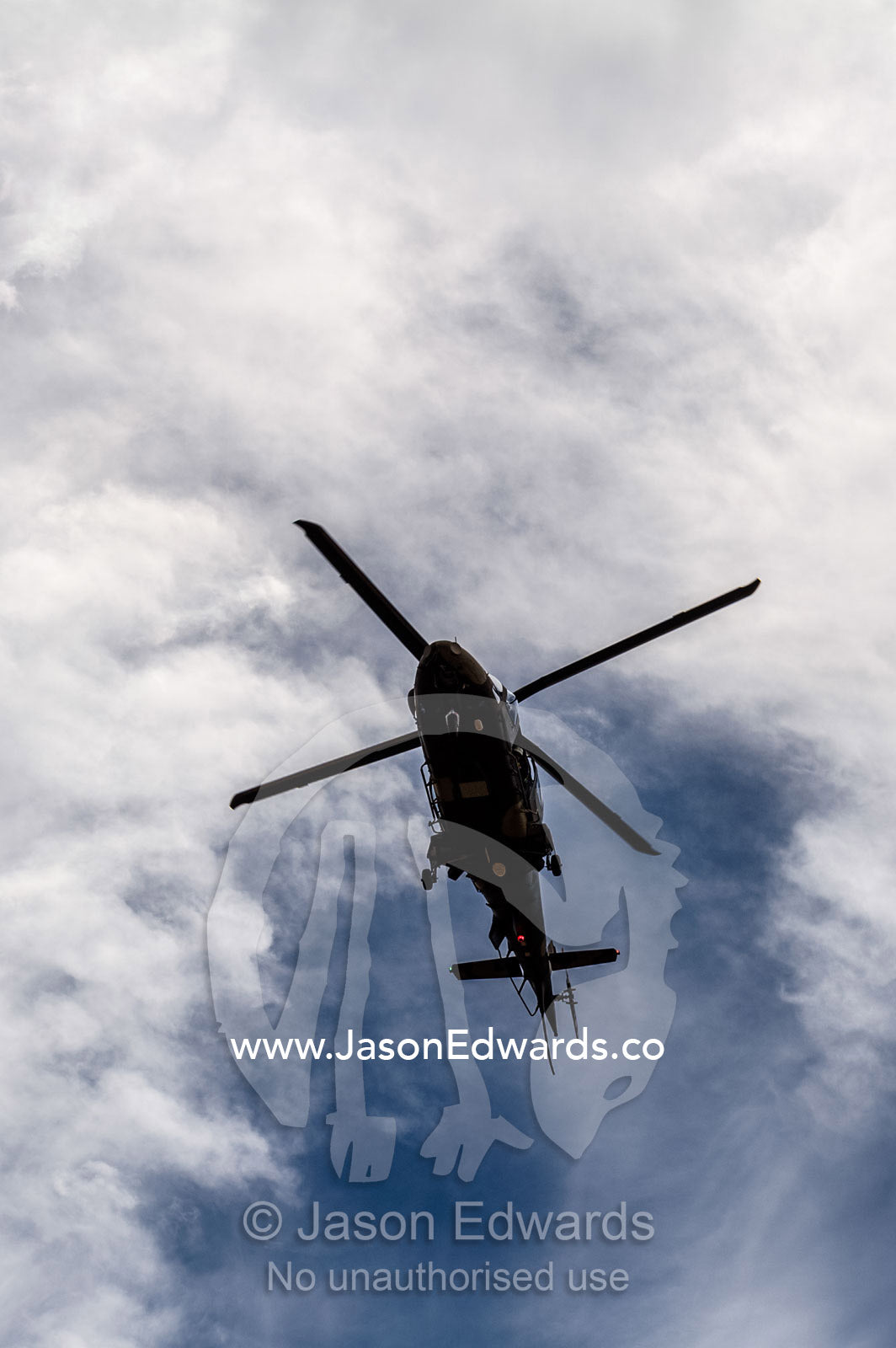 A helicopter searches for people trapped in floods. Kruger National Park, South Africa.