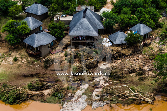 A safari resort devastated by flood waters trapping guests and staff. Kruger National Park, South Africa.