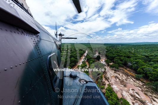 The fuselage of an airforce Atlas Oryx helicopter on flood patrol. Kruger National Park, South Africa.