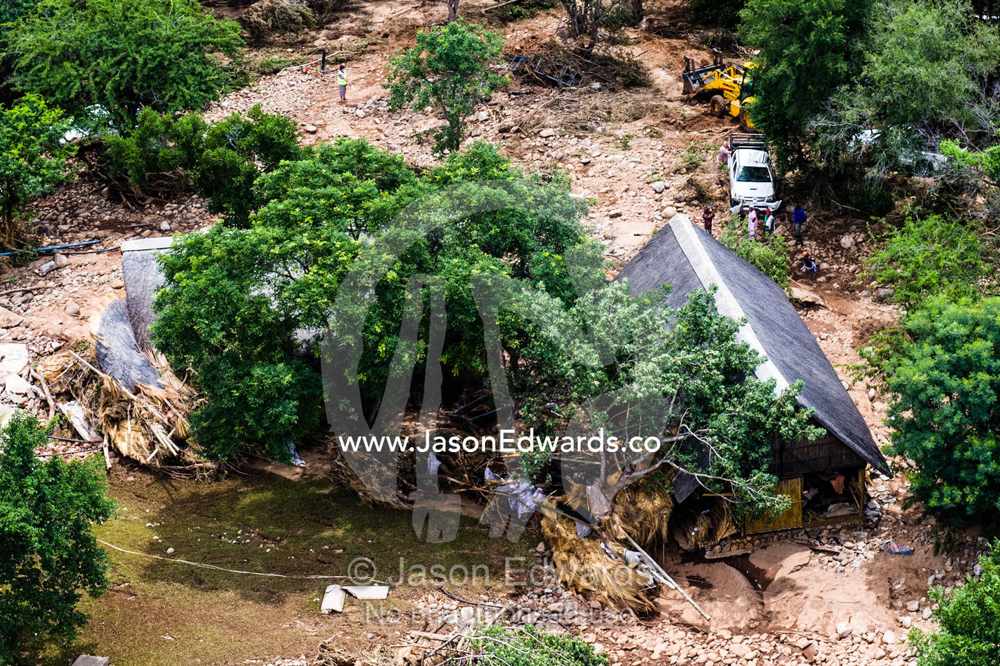 A village on a savannah plain destroyed by raging flood waters. Kruger National Park, South Africa.