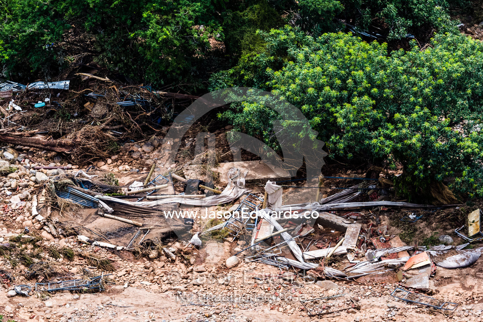 Debris from a village on a savannah destroyed by raging flood waters. Kruger National Park, South Africa.