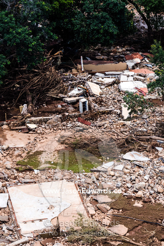 Debris and rubble from a village destroyed by flood waters. Kruger National Park, South Africa.