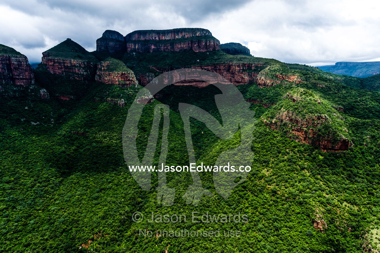 Rugged mountain canyons and cliffs shrouded in dense primeval forest. Blyde River Canyon, South Africa.