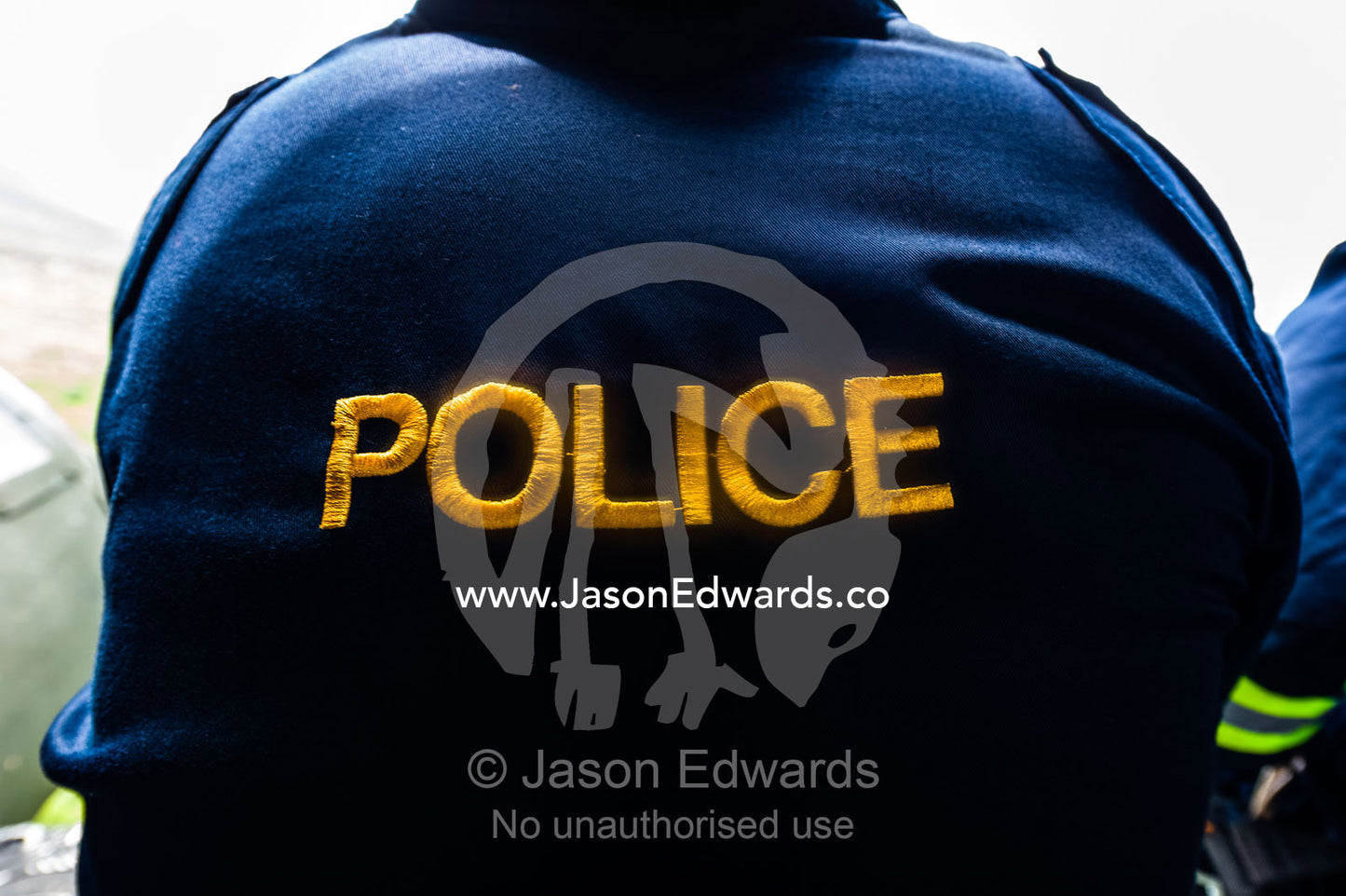 A police rescue officer jacket on duty in an airforce helicopter. Kruger National Park, South Africa.