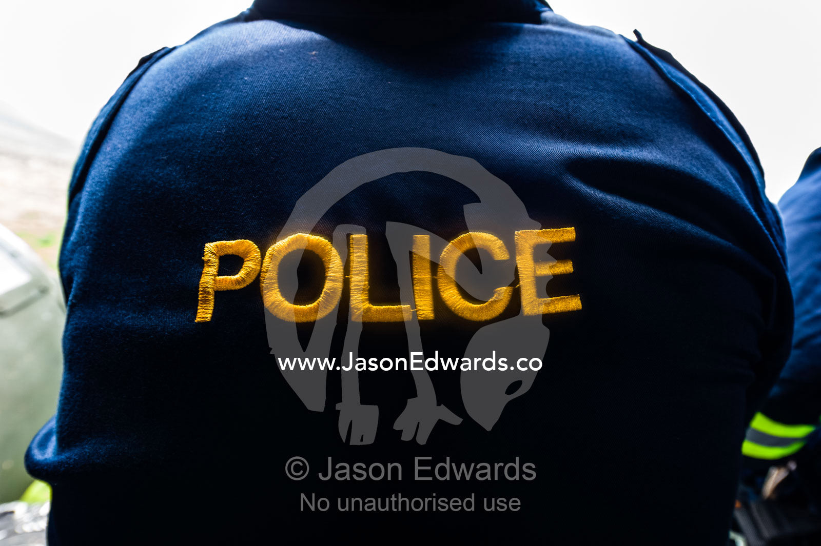 A police rescue officer jacket on duty in an airforce helicopter. Kruger National Park, South Africa.