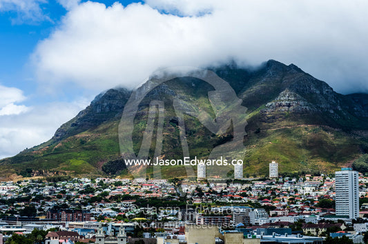 Sprawling suburbs and high-rise apartments below Table Mountain. Cape Town, Cape Peninsula, Western Cape, South Africa.