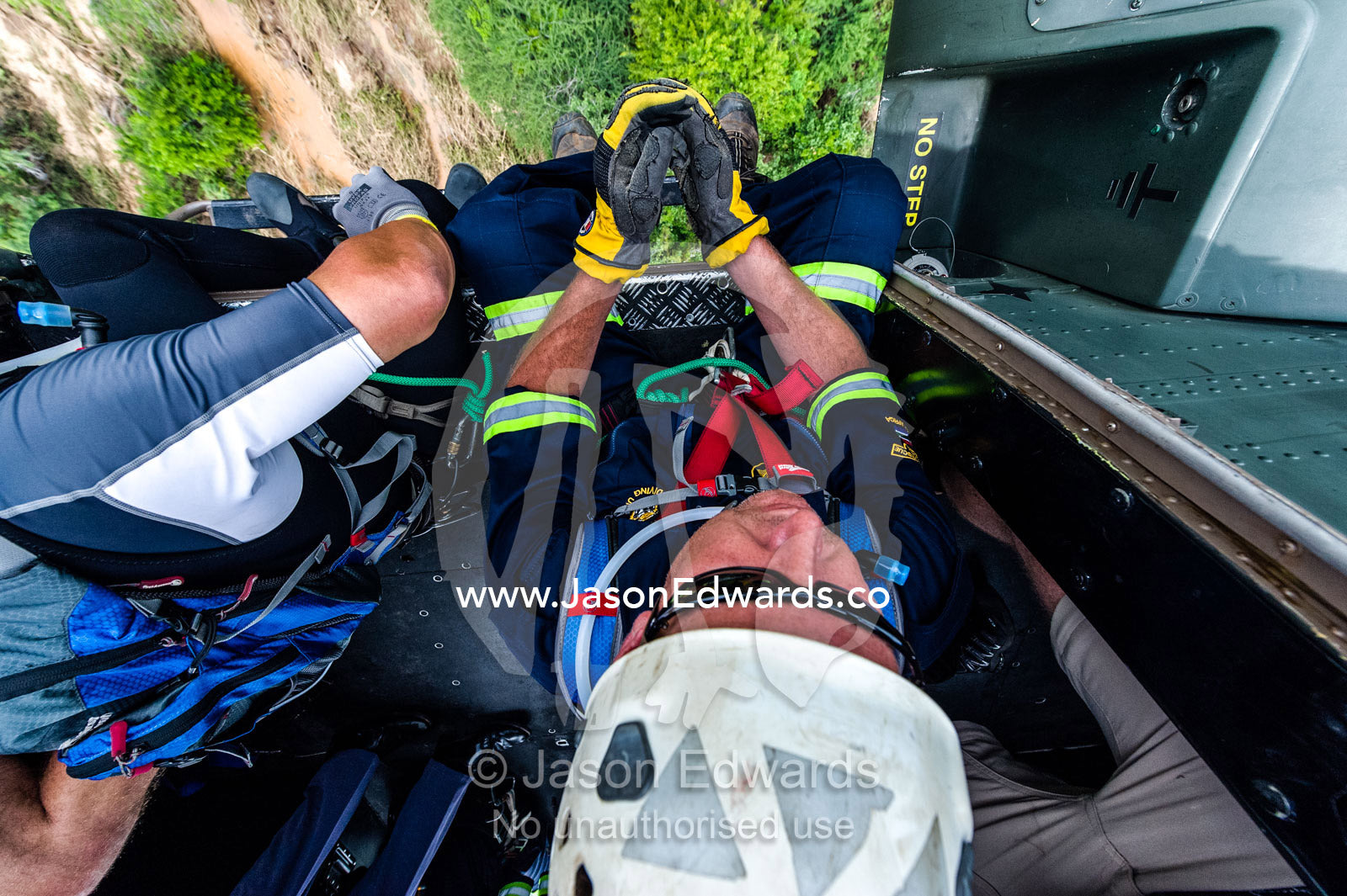 Police and Airforce rescue crews search for trapped flood survivors. The Lowveld Area, Olifants River, Kruger National Park, South Africa.