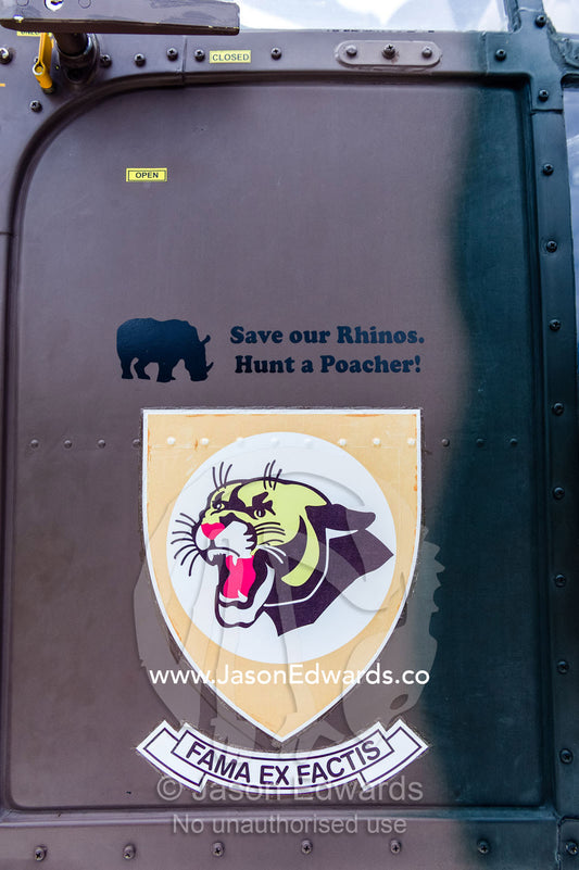 Rhino anti-poaching logo on the door of an airforce helicopter. Kruger National Park, South Africa.