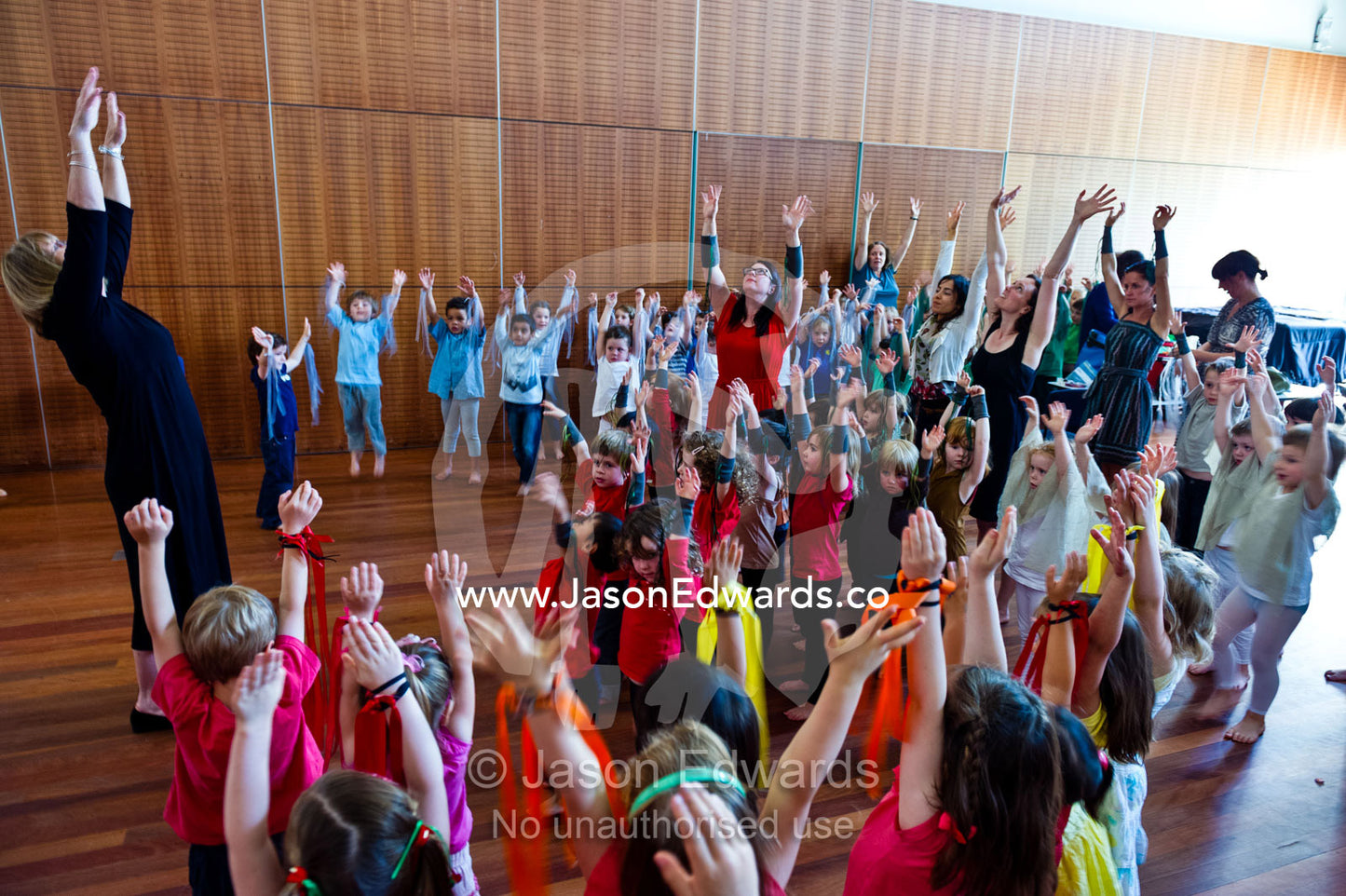 Kindergarden children stretch before performing school play theatre. Kew, Melbourne, Victoria, Australia.