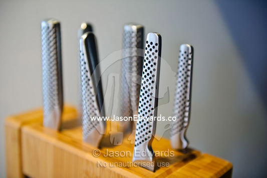 A wooden knife holding block in an inner city apartment kitchen. North Melbourne, Melbourne, Victoria, Australia.