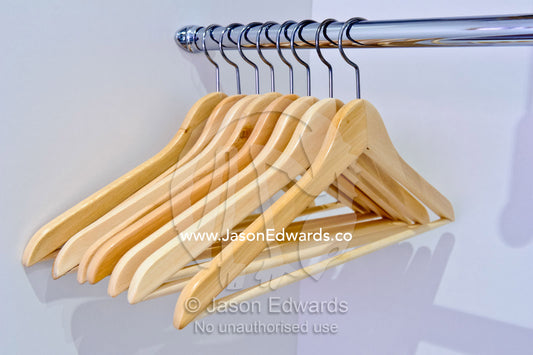 New coat hangers in an inner city townhouse apartment wardrobe. North Melbourne, Melbourne, Victoria, Australia.