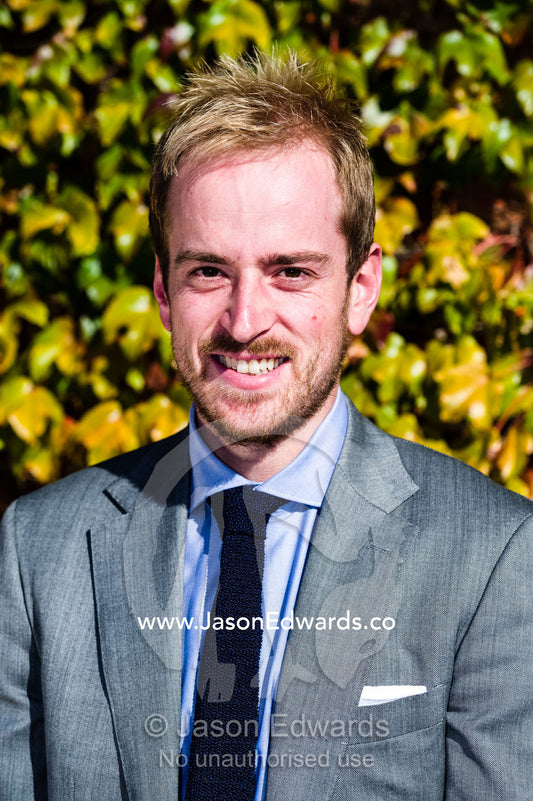 A well-dressed real estate agent in a business suit. Collingwood, Melbourne, Victoria, Australia.