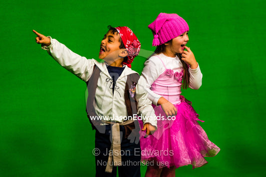 School children performing in front of a green screen at a studio. Victoria, Melbourne, Australia.