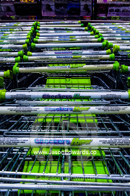 Empty supermarket trolleys jammed together in a shopping mall. Menlyn Park, Pretoria, Menlyn Mall, Pretoria, Gauteng Province, South Africa.