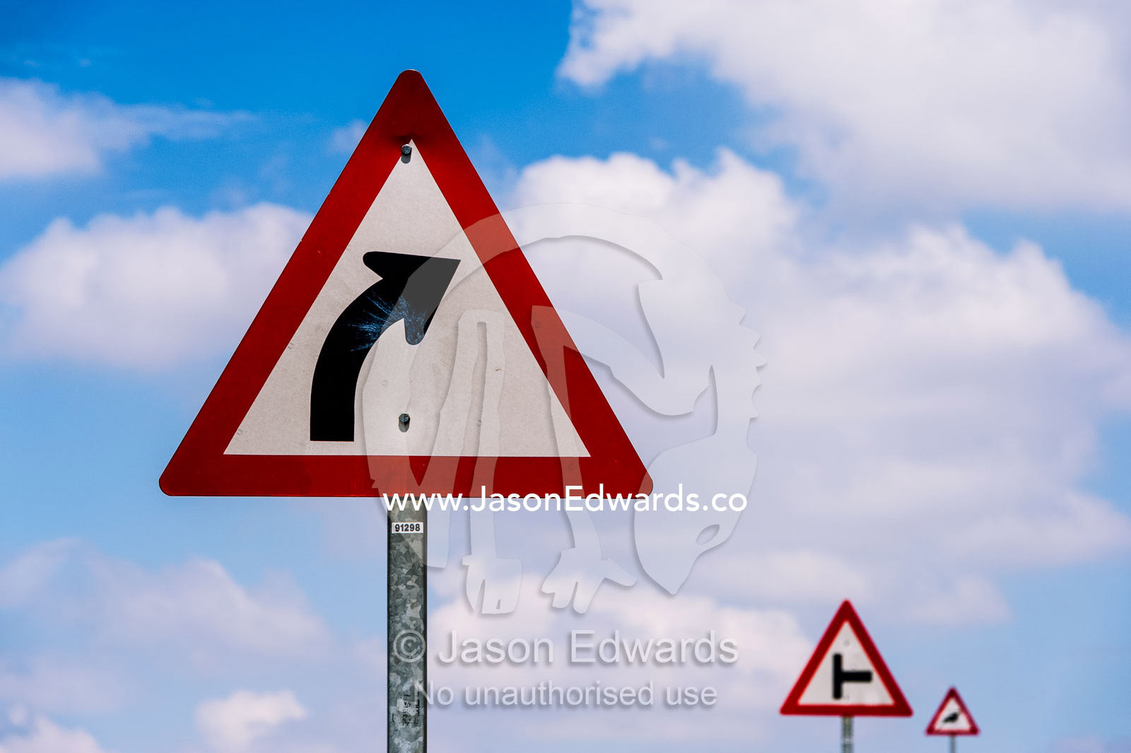 A series of signs warn of impending driving hazards and dangers. Waterkloof 101, Pretoria, Gauteng Province, South Africa.