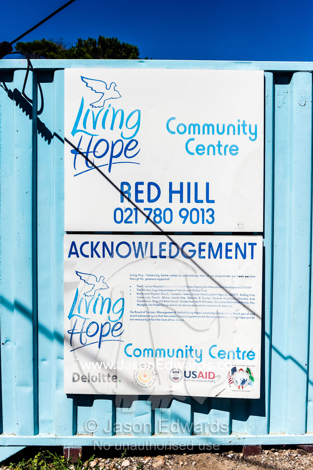 Sponsorship signs list contributors to underprivileged projects. Red Hill Township and Pre-School, Cape Town, Western Cape, South Africa.