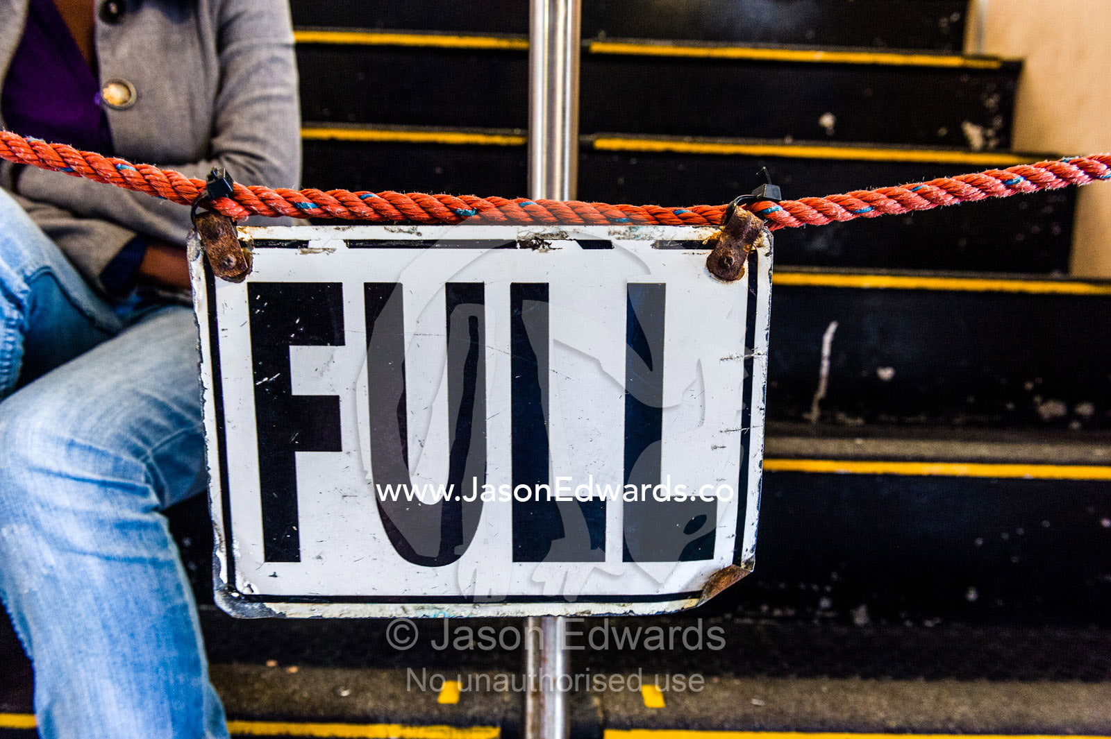 A sign indicates the upper deck chairs of a passenger ferry are full. Robben Island, Cape Town, Bloubergstrand, Table Bay, Western Cape, South Africa.