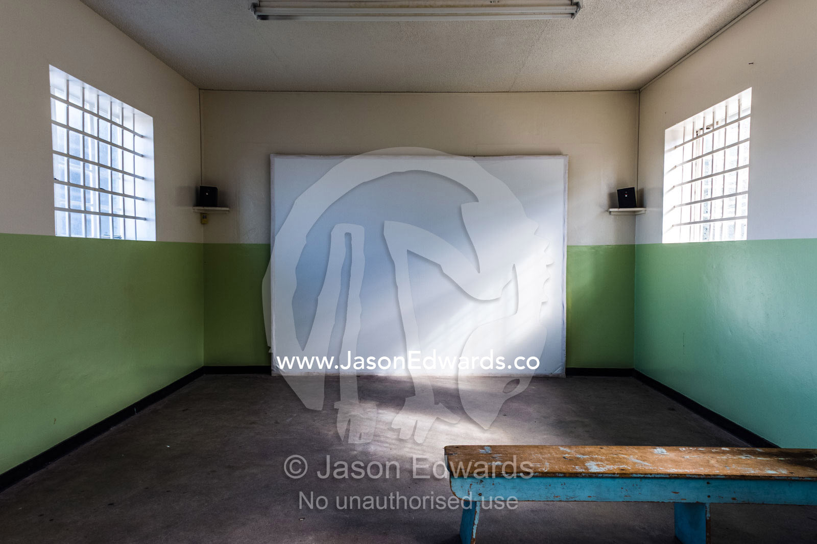 A solitary bench in a prison classroom where prisoners were taught. Robben Island, Cape Town, Bloubergstrand, Table Bay, Western Cape, South Africa.