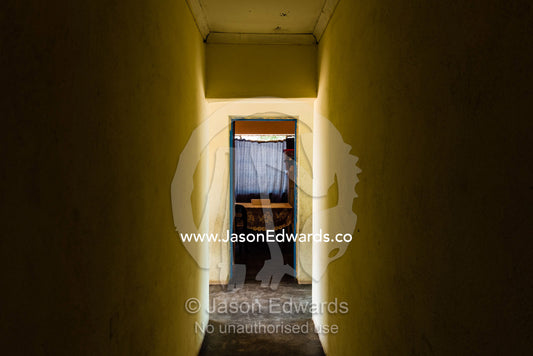 A corridor leads to the kitchen in a small African primary school. Kruger National Park, Manyeleti, Shalati Village, Mnisi Community, Limpopo, South Africa.