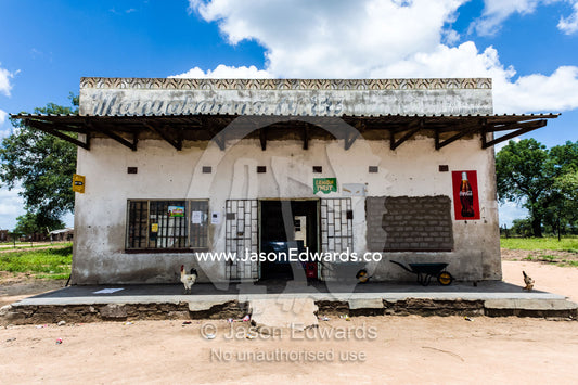 A general store replete with a chicken in a small African village. Kruger National Park, Manyeleti, Shalati Village, Mnisi Community, Limpopo, South Africa.