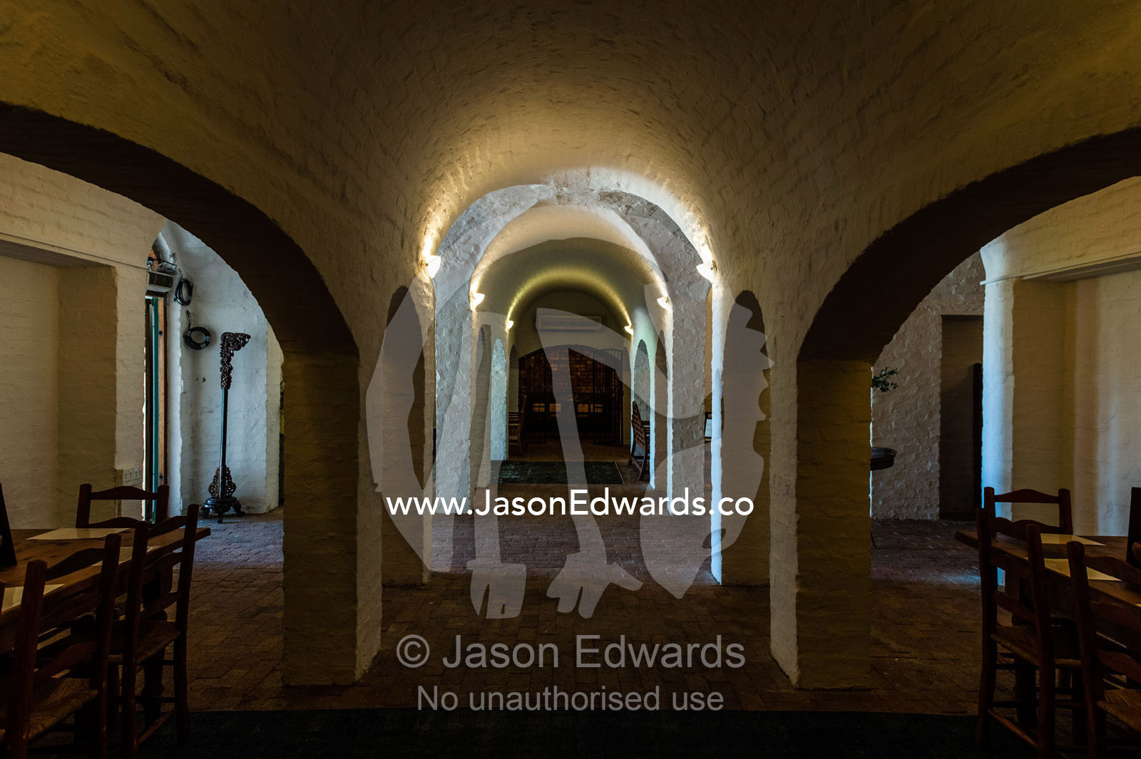 The domed vaulted ceiling of a winery cellar and tasting room. Spice Route Winery, Stellenbosch, Western Cape, South Africa.