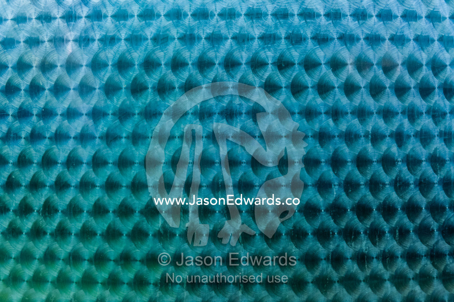 Circular buffing marks on a stainless steel tank used to ferment wine. Fairview Wine Estate, Stellenbosch, Western Cape, South Africa.