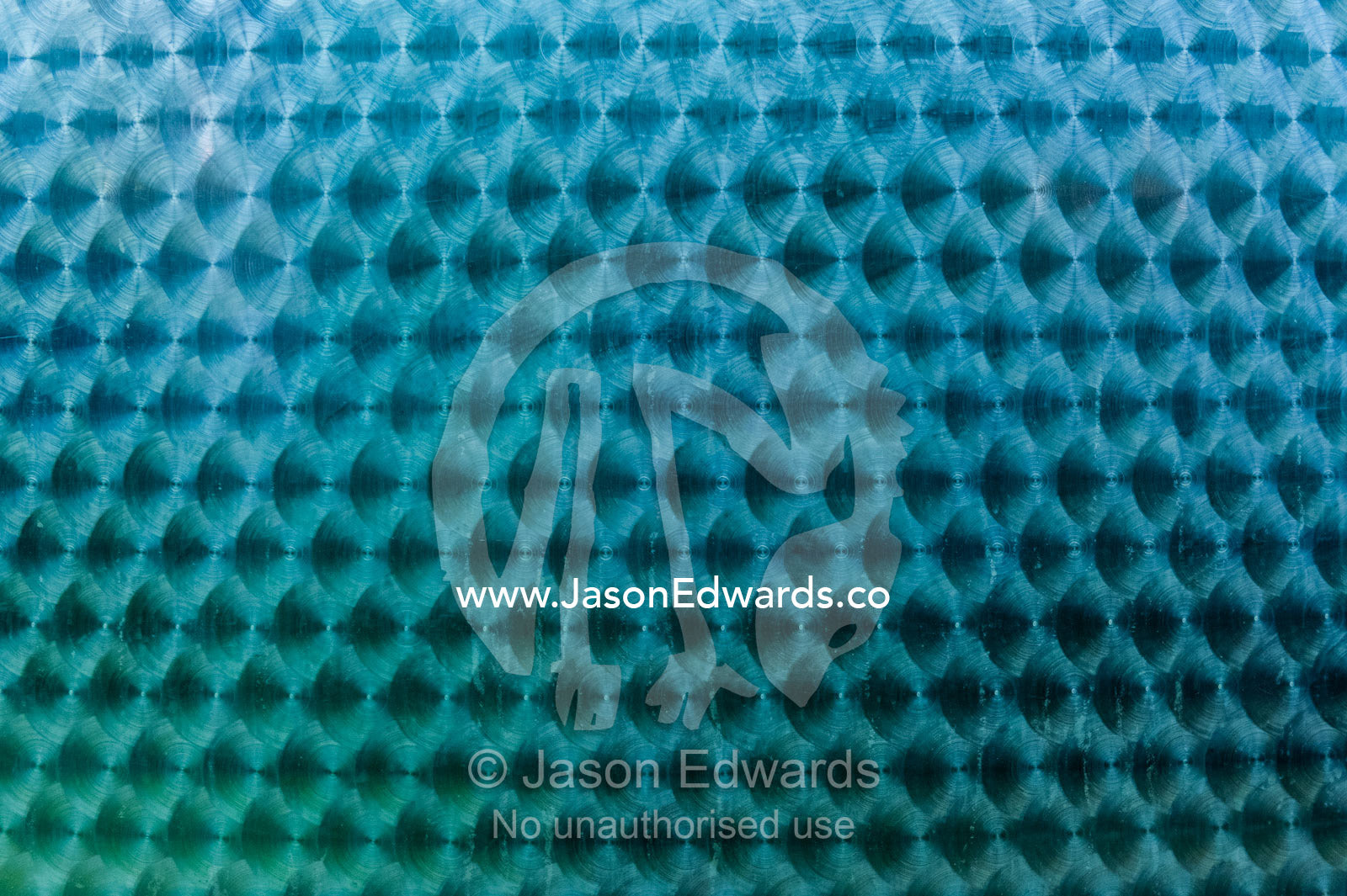 Circular buffing marks on a stainless steel tank used to ferment wine. Fairview Wine Estate, Stellenbosch, Western Cape, South Africa.