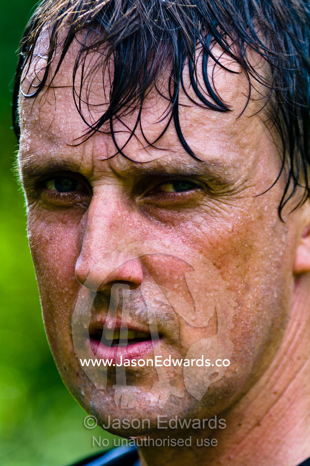 A researcher dripping with sweat whilst hiking through the Amazon jungle. Amazon River, Amazon Basin, Loreto Region, Maynas Province, Peru.
