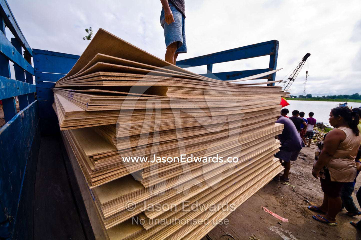 Timber planks are cut in a single piece from large Amazon rainforest trees for use in construction. Puerto Masusa, Iquitos, Amazon Basin, Loreto Region, Maynas Province, Peru.