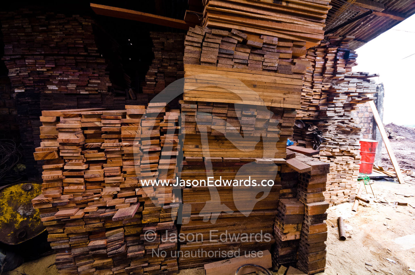 Timber slats cut from rainforest trees stacked for sale in a logging mill. Puerto Masusa, Iquitos, Amazon Basin, Loreto Region, Maynas Province, Peru.