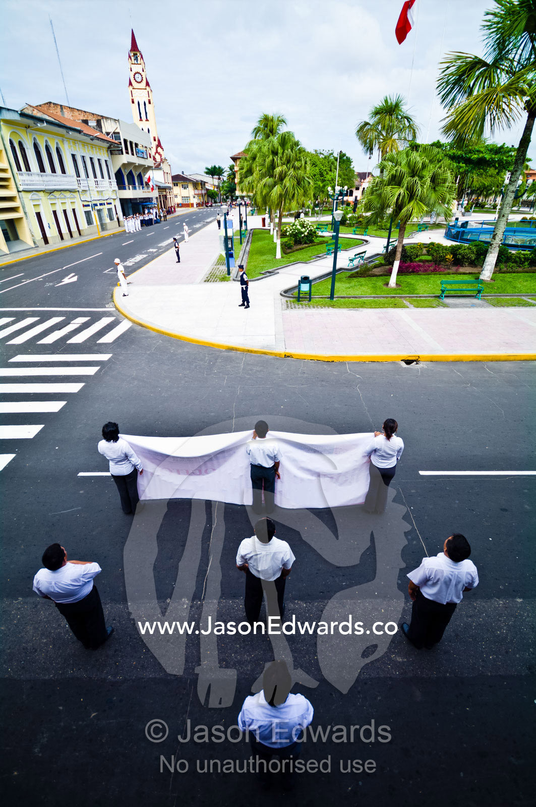 Government employees standing in formation at a military parade honoring fallen soldiers. Plaza de Armas, Iquitos, Amazon Basin, Loreto Region, Maynas Province, Peru.