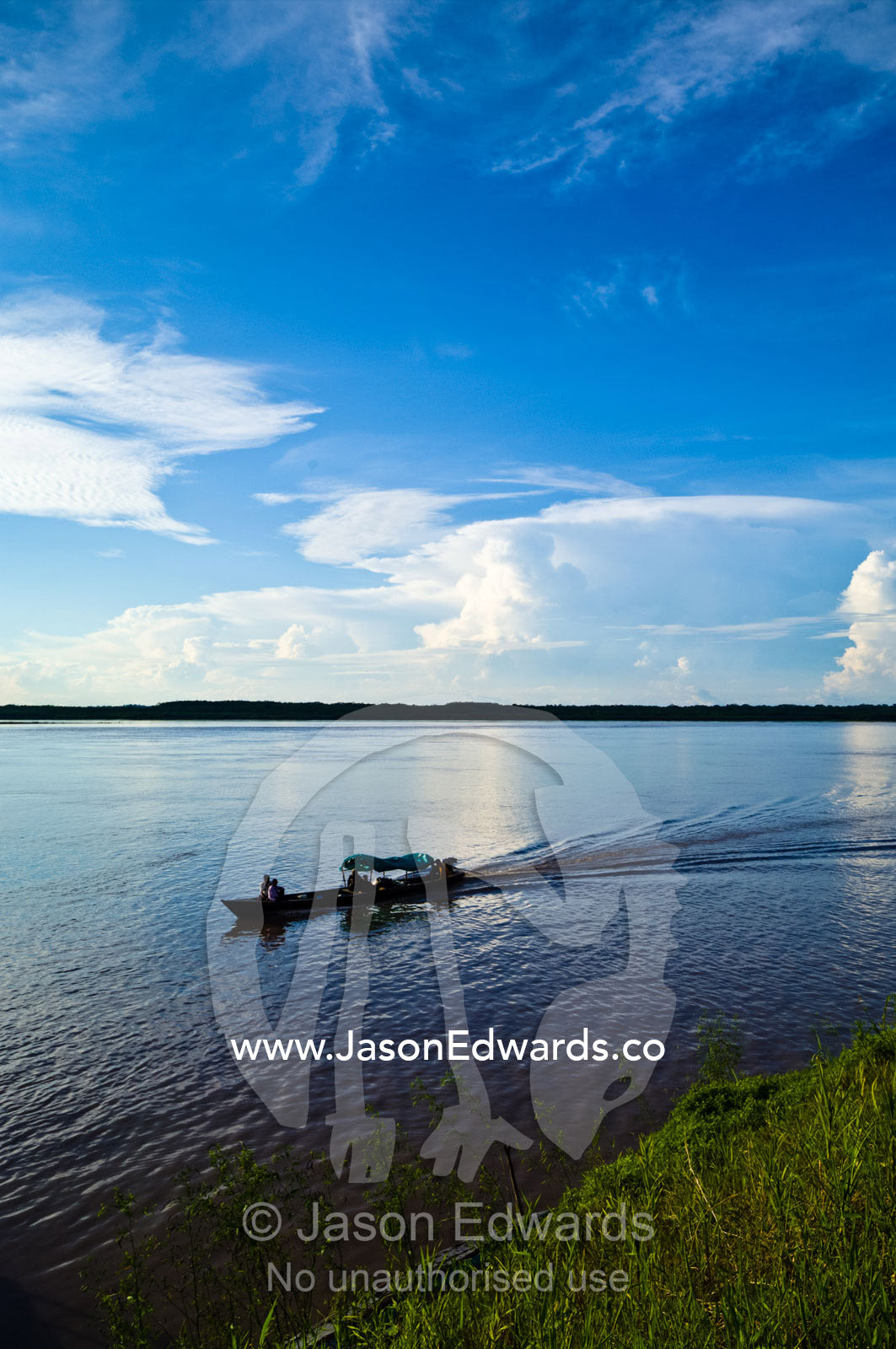 A water taxi carrying goods and villagers travelling upriver to market. Pacaya-Samiria National Reserve, Reserva Nacional Pacaya - Samiria, Loreto Region, Maynas Province, Amazon Basin, Peru.