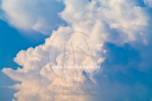 A billowing thunderhead storm forms over a tropical rainforest canopy. Pacaya Samiria Reserve, Reserva Nacional Pacaya Samiria, Maranon River, Rio Maranon, Loreto Region, Maynas Province, Amazon Basin, Peru.