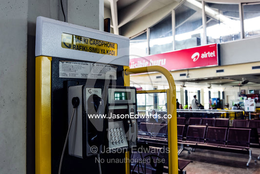 A credit card operated public pay phone in an airport waiting lounge. Julius Nyerere International Airport, Dar es Salaam International Airport, Tanzania.