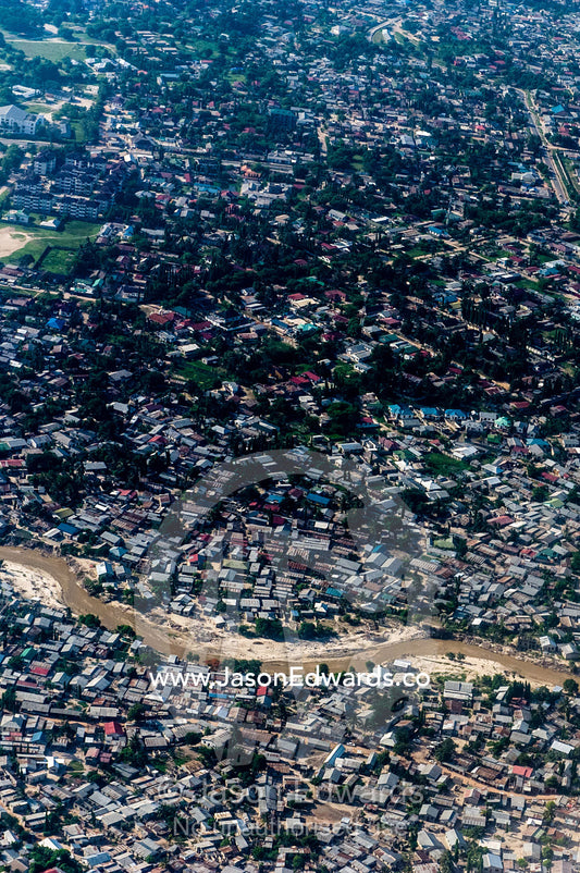 A densely populated suburban community crowded around Dar es Salaam's urban sprawl. Dar es Salaam, Tanzania.