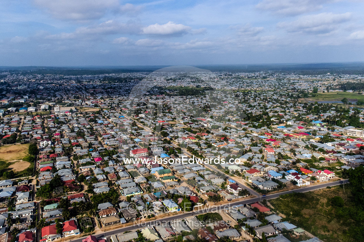 A densely populated suburban community crowded around Dar es Salaam's urban sprawl. Dar es Salaam, Tanzania.