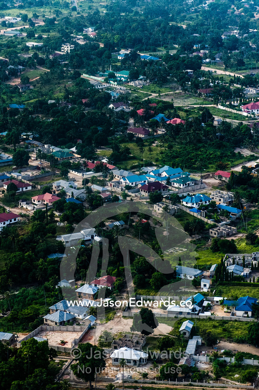 A densely populated community crowded around Dar es Salaam's urban sprawl. Dar es Salaam, Tanzania.