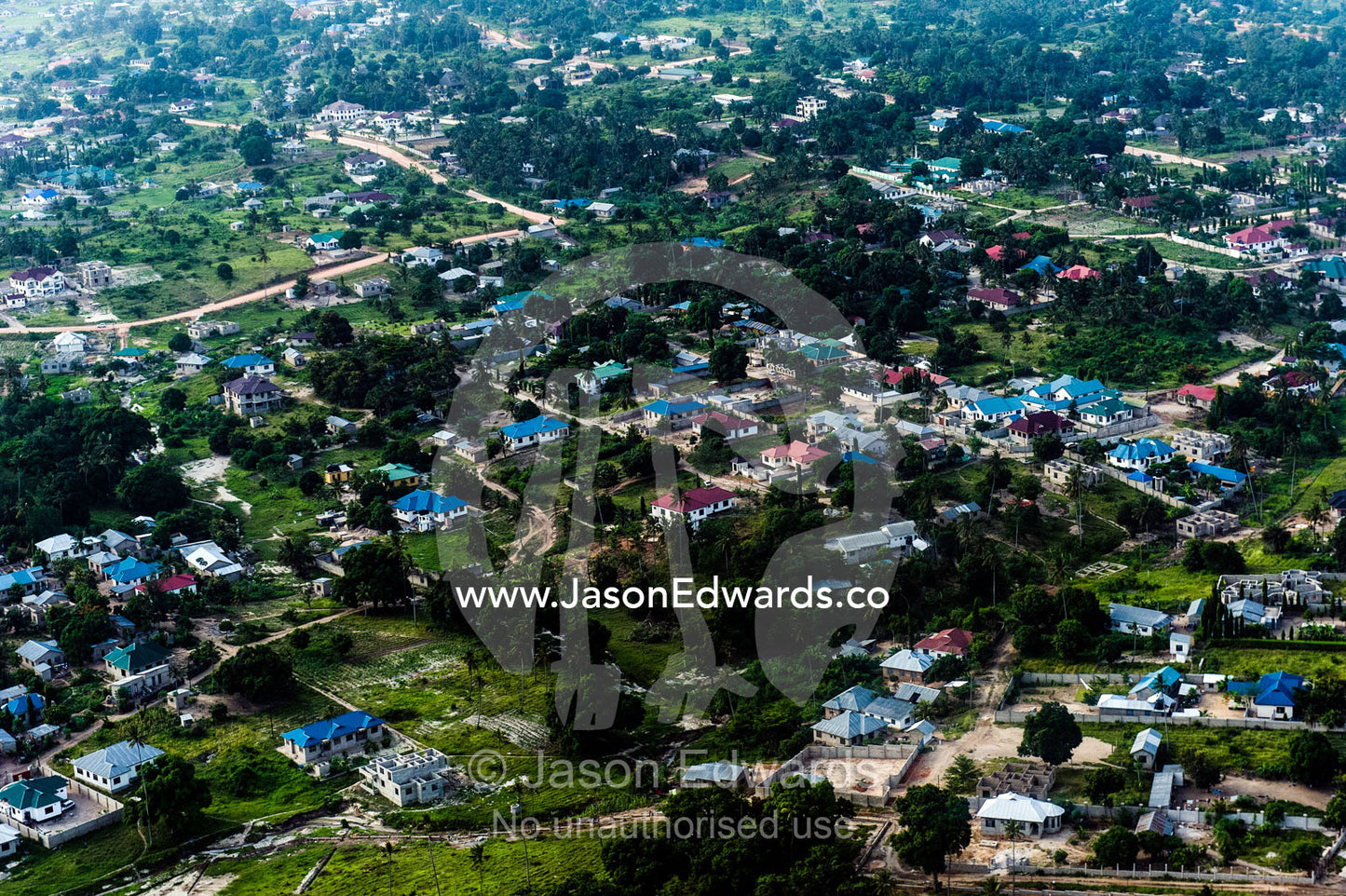 A densely populated community crowded around Dar es Salaam's urban sprawl. Dar es Salaam, Tanzania.