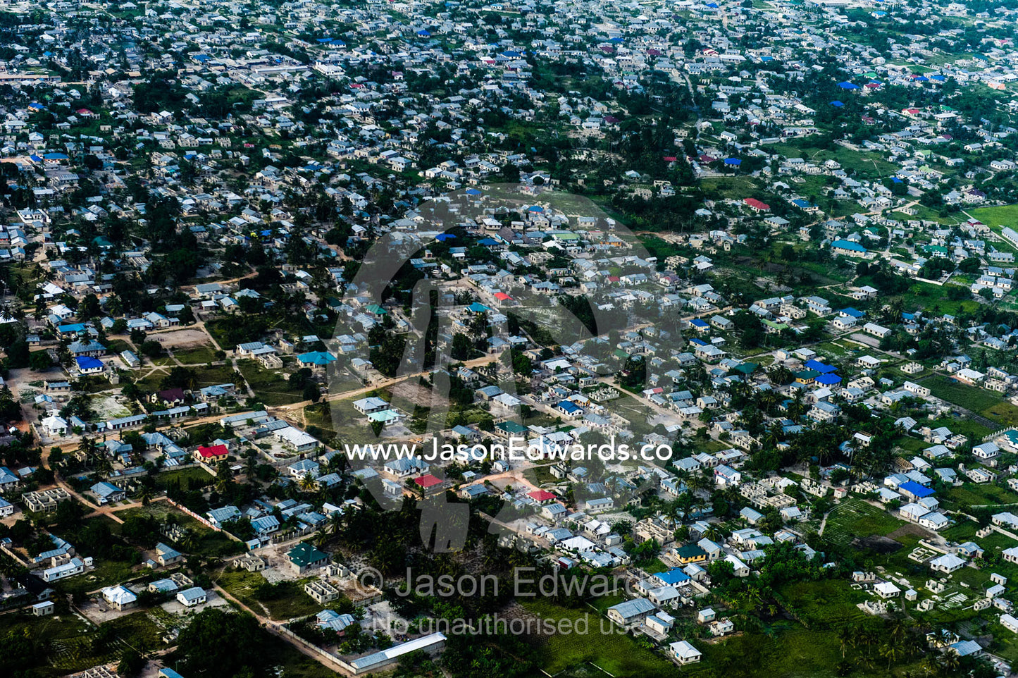 A densely populated community crowded around Dar es Salaam's urban sprawl. Dar es Salaam, Tanzania.