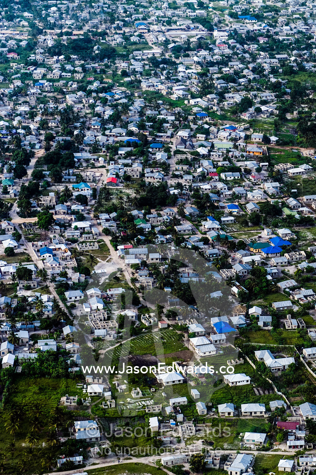 A densely populated community crowded around Dar es Salaam's urban sprawl. Dar es Salaam, Tanzania.