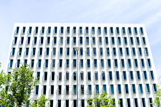 Rectangular windows in the concrete facade of an office building. Canberra, ACT, Australian Capital Territory, Australia.