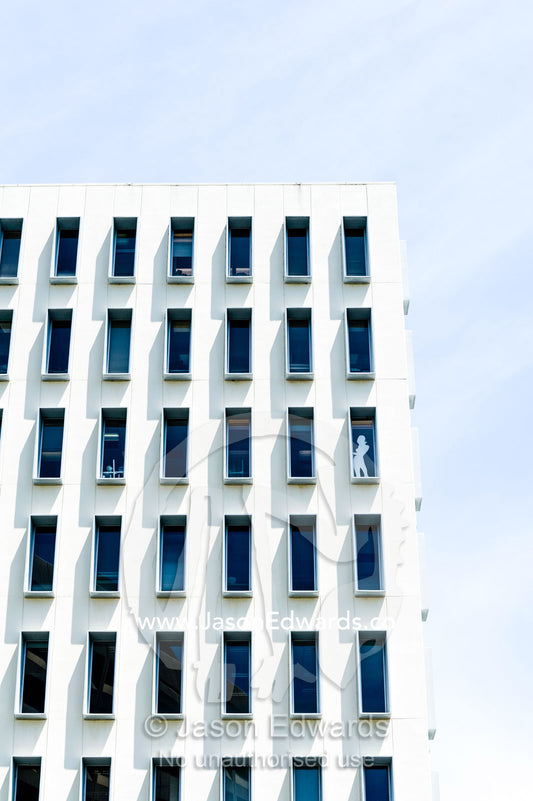 Rectangular windows in the concrete facade of an office building. Canberra, ACT, Australian Capital Territory, Australia.