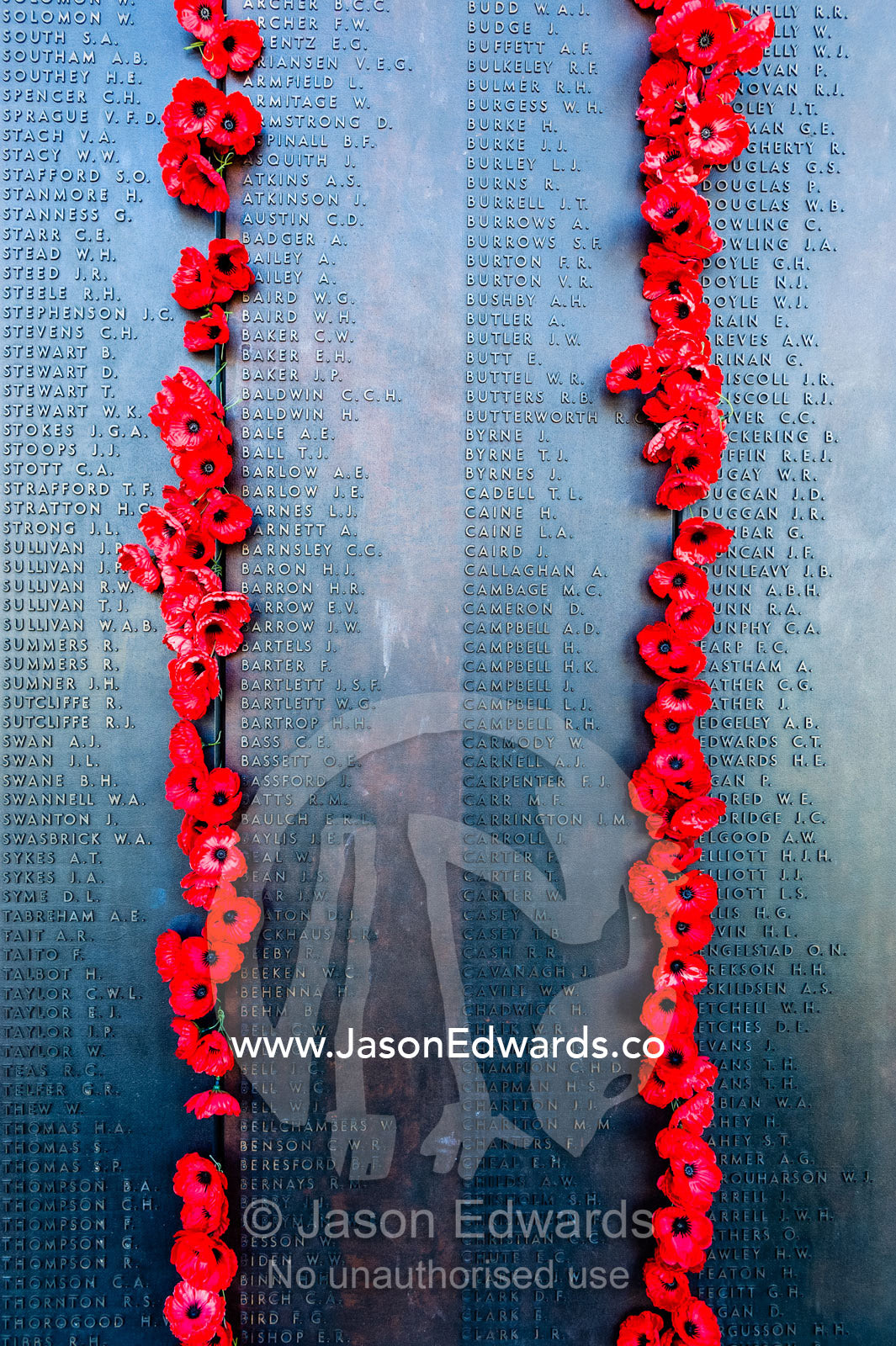 The Roll of Honour and the names of fallen soldiers remembered with bright red poppies overlook the Hall of Memory. Australian War Memorial, Canberra, Australian Capital Territory, Australia.