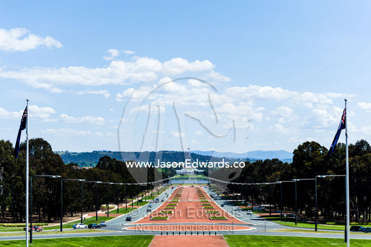 Looking down ANZAC Parade to Capital Hill and Parliament House from the entrance of the Australian War Memorial. Australian War Memorial, Canberra, Australian Capital Territory, Australia.